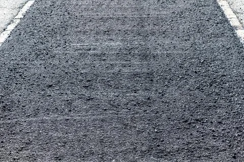 Asphalt texture from the final paving Stock Photos
