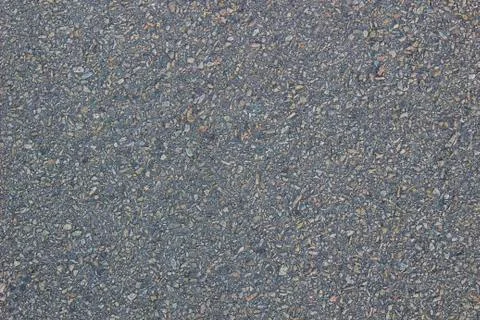 Asphalt texture with patches of stone, background Stock Photos