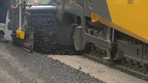 Asphalting with black asphalt. summer. Stock Footage 154703175
