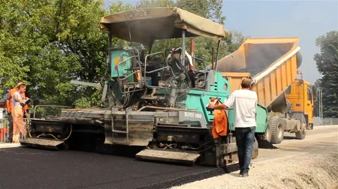 Asphalting. Machine for paving apply asphalt to road. Roadworks. Stock Footage 41731619
