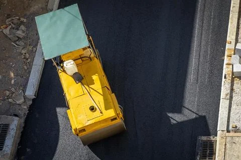 Asphalting machine press compactor Stock Photos