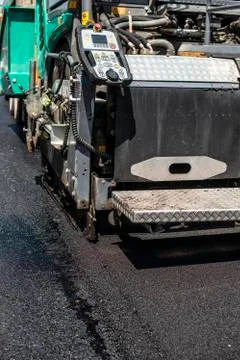 Asphalting machine on the road. Foto stock
