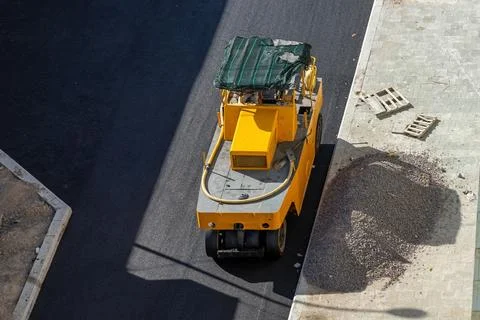 Asphalting road machine Stock Photos
