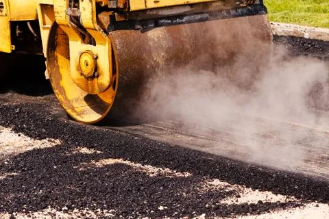 Asphalting of the road Stock Photos