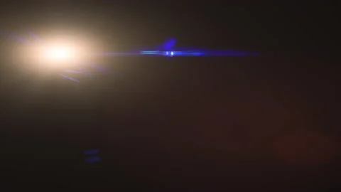 Aspherical lens flare moving from the left side to right isolated on a black Stock Footage 152737882
