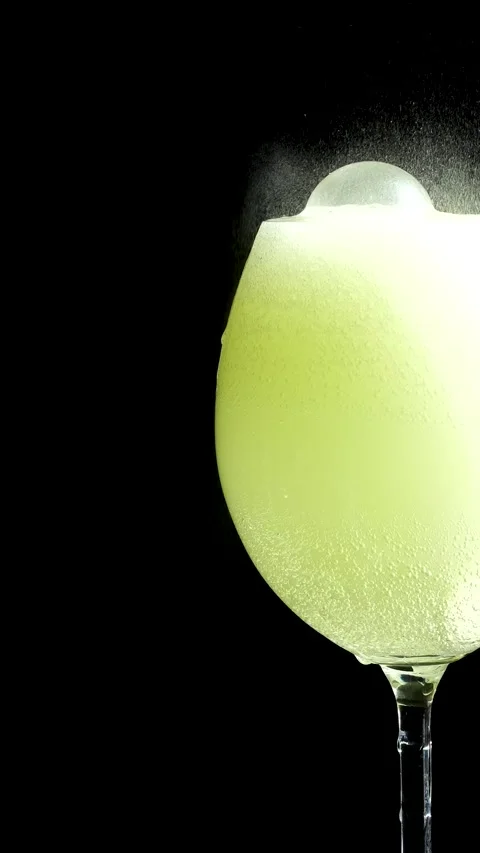 Aspirin tablet fizzing in a glass Effervescent Tablet Sinks to the Bottom of the Stock Footage 295868853