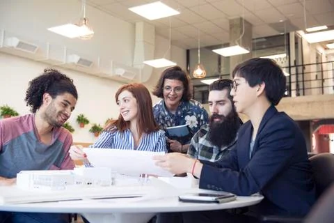 Aspiring architects working on project together Stock Photos