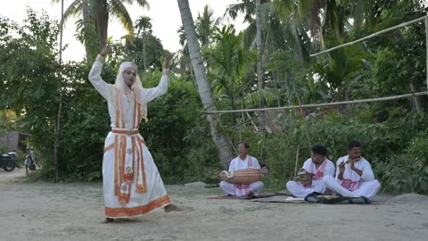 ASSAM, INDIA - 2021, MAY 8: Sattriya Dancer Performing with Live Folk Musicians Stock Footage 208906073