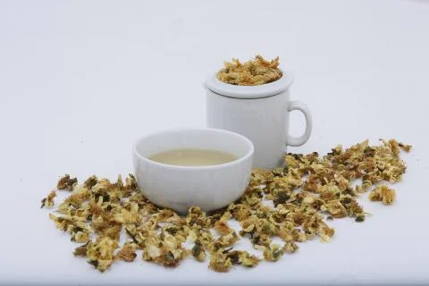 Assam Tea with Tea Flower Stock Photos
