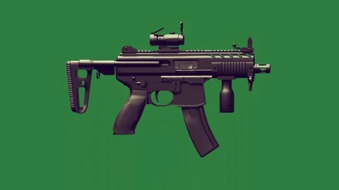 An assault rifle on a and gun with in the background camera attached to it toy Stock Footage 336969357
