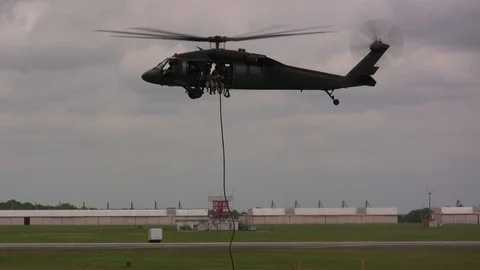 Assault troops drop from Blackhawk helicopter HD 動画素材 93364845