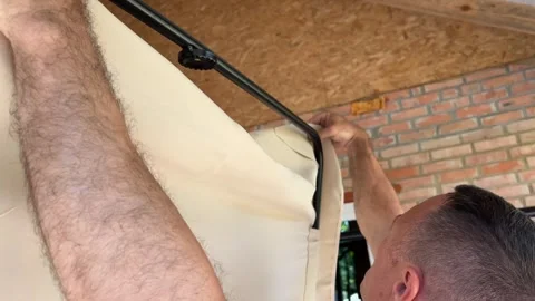 Assemble swing in garden prepared stack of planks is slowly put together into Stock Footage 316824817