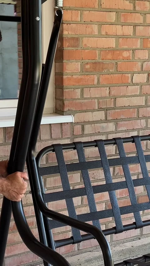 Assemble swing in garden prepared stack of planks is slowly put together into Vídeo Stock 318978151