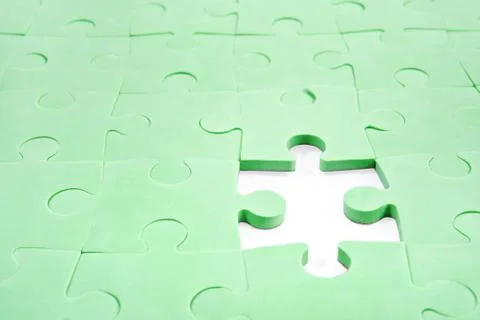 Assembled puzzle without one element Stock Photos