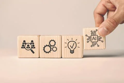 Assembled wooden cubes on the topic of the application of artificial Stock Photos