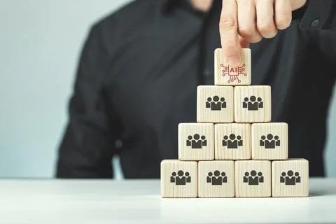 Assembled wooden cubes on the topic of the application of artificial Stock Photos