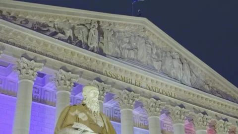 Assemblée Nationale Paris night panning down statue blue white red tricolor Stock Footage 324948845