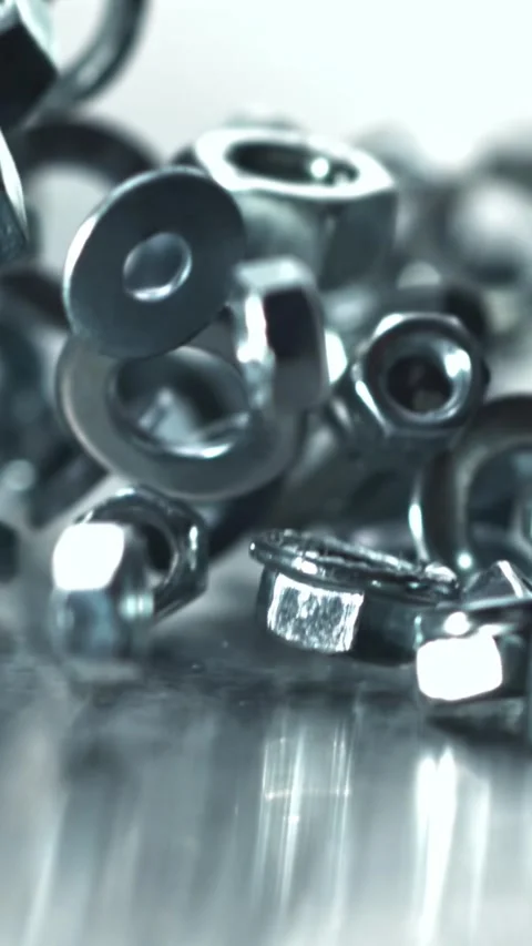 Assembler components cascade cinematic macro hardware Filmed on a high-speed Stock Footage 335396077