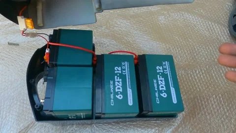 Assembling and connecting the battery to the electric bike Stock-Footage 201176585