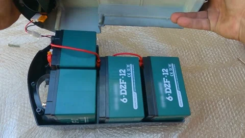 Assembling and connecting the battery to the electric bike Stock-Footage 201177292