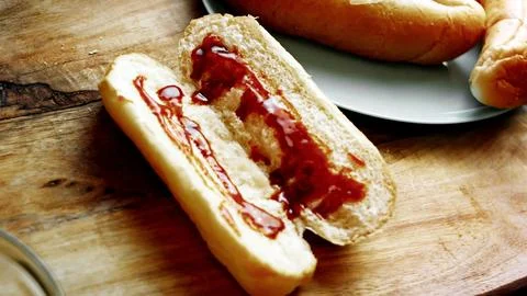 Assembling BBQ Bratwurst in Soft Buns — Wide Preparation View Stock Photos