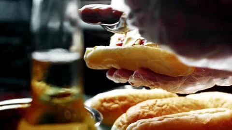 Assembling BBQ Bratwurst in Soft Buns — Selective Focus Detail Stock Photos