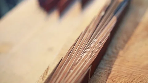 Assembling a billiard cue. Thin wood Stock Footage 75951497