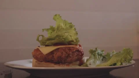 Assembling cheese in a burger Stock Footage 132997849