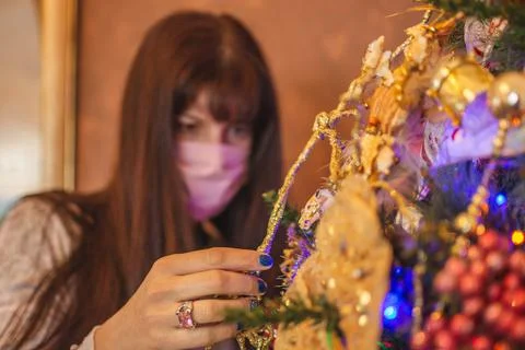 Assembling christmas tree with mask Stock Photos
