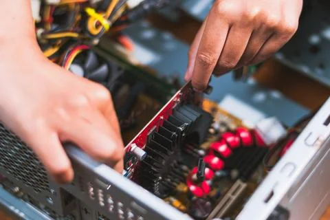 Assembling a computer graphics card installation home workshop tutorial ind.. Stock Photos