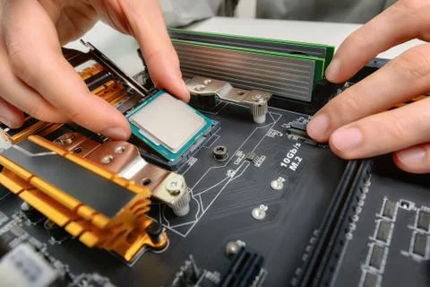 Assembling computer parts, closeup Foto stock