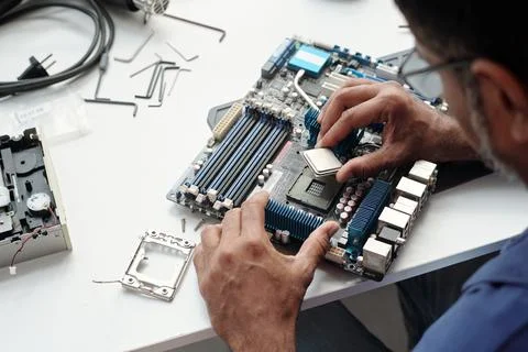 Assembling Computer Parts on White Table 스톡 사진