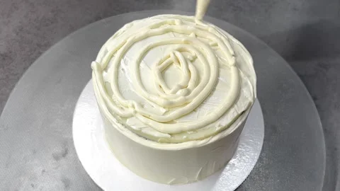 Assembling a cottage cheese pie on a gray table. cake ingredients. Stock Footage 244516483