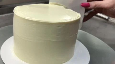 Assembling a cottage cheese pie on a gray table. cake ingredients. Stock Footage 244516487