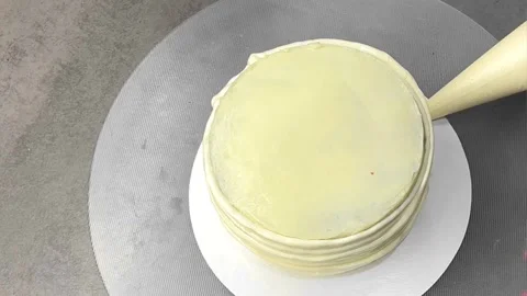 Assembling a cottage cheese pie on a gray table. cake ingredients. Stock Footage 244516508