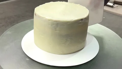 Assembling a cottage cheese pie on a gray table. cake ingredients. Stock Footage 244516522