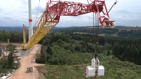 Assembling a crane and wind power plant on the background. Stock-Footage 73123966