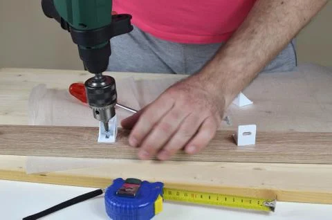 Assembling with an Electric Screwdriver Stock Photos