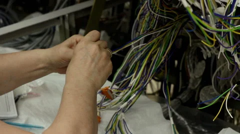 Assembling of the electric wiring of the electrical equipment. Stock Footage 64455600