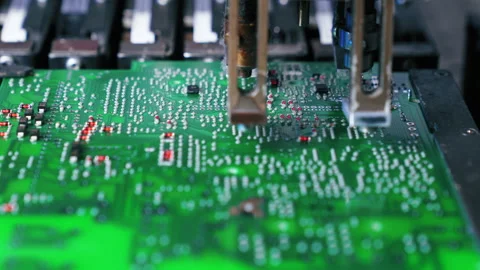 Assembling electrical components of PCB printed circuit board in SMD surface Stock Footage 214103808