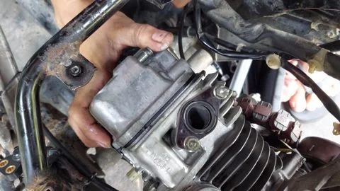 Assembling the engine cover Stock Footage 292391439