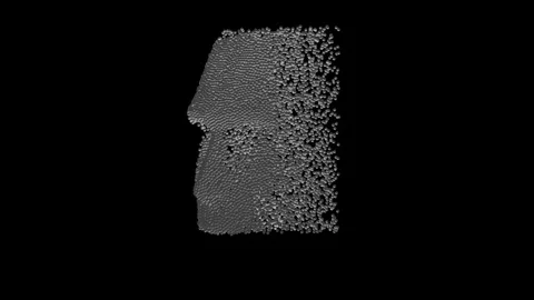 Assembling a face from round gold partic... | Stock Video | Pond5
