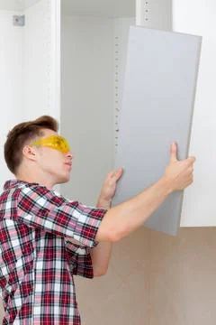 Assembling furniture Stock Photos