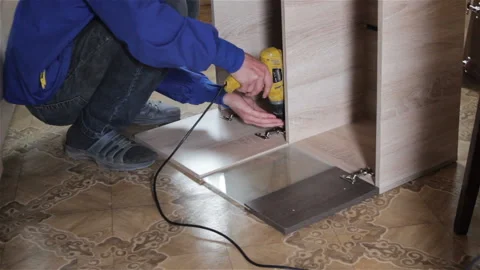 Assembling Of Furniture Power Tools Stock Footage 89440447