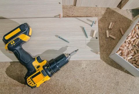 Assembling of furniture power tools Stock Photos