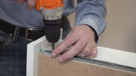 Assembling furniture with a screwdriver Stock-Footage 318900916