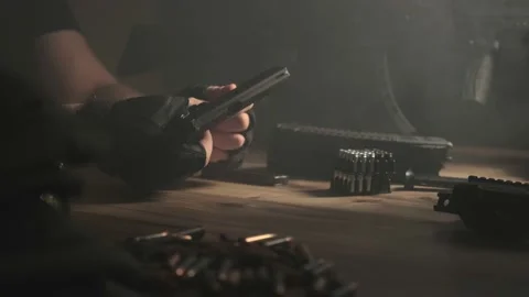Assembling the gun. Military ammunition. Weapon care. Stock Footage 230940290