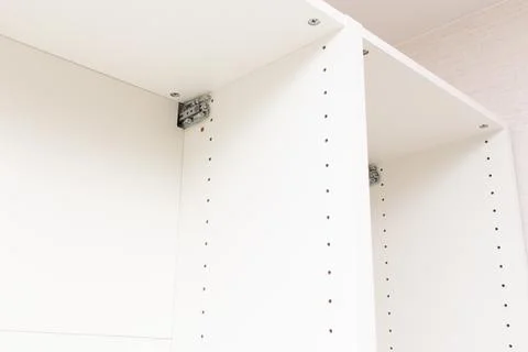 Assembling Kitchen Cabinets. Renovated kitchen interior Stock Photos