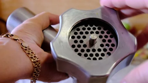 Assembling the meat grinder twisting the ring 스톡 동영상 201084406