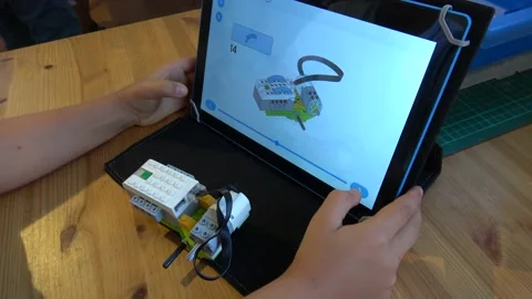 Assembling a mechanical device using programme in tablet computer Video stock 162564449